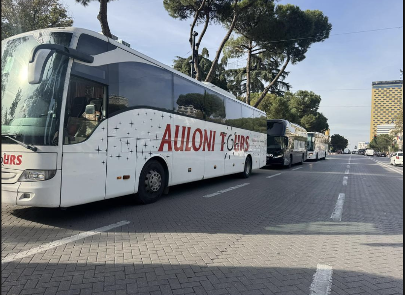 Auloni Tours bus on a scenic route